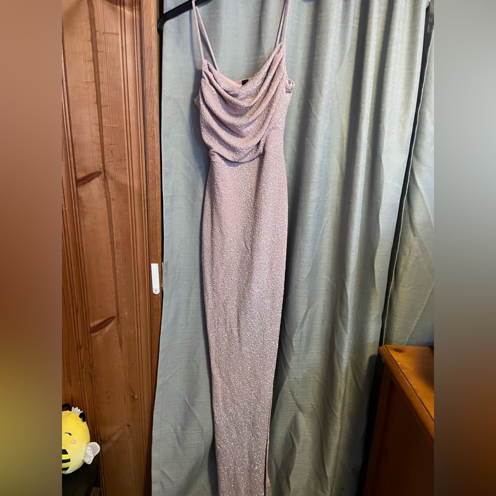 Windsor, medium, pink glittery prom dress with leg slit.